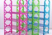 Plastic shoe rack with metal rods