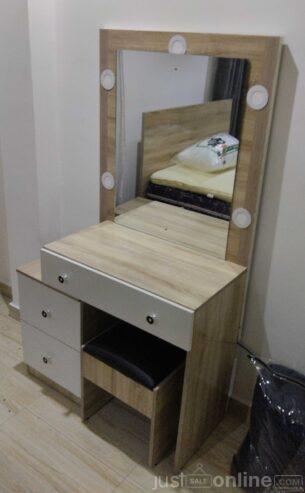 Dressing mirror with stool for sale in mushin