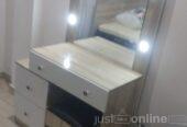 Dressing mirror with stool for sale in mushin