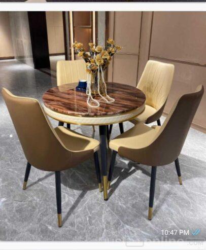 4 sitters marble dinning table for sale at ojo Alaba ma