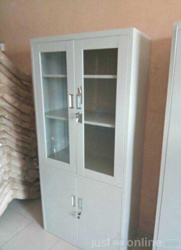 Half glass, half metal cabinet for sale in ojo Alaba market