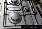 Four burner with gas oven for sale at alaba market