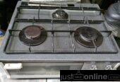 Four burner with gas oven for sale at alaba market