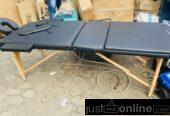 Wood foldable massage/facial bed for sale at tradefair