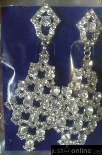 Zirconia drooping earrings for sale at trade fair marke