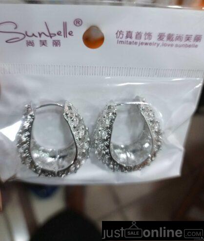 Sunbelle ear rings for sale at trade fair market