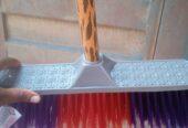 Stick broom for sale at trade fair