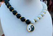 Yin-yang neck bead for sale at tradefair market