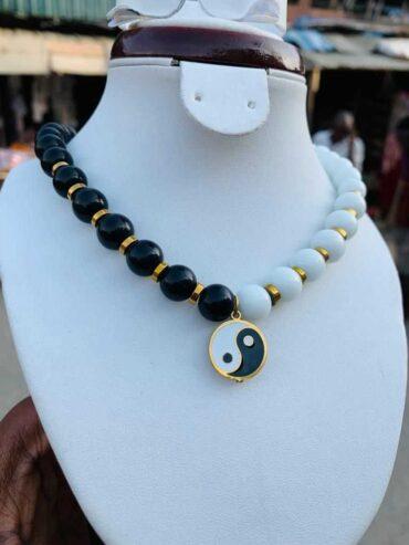 Yin-yang neck bead for sale at tradefair market