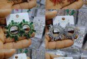 Celebrity earrings for sale at balogun market