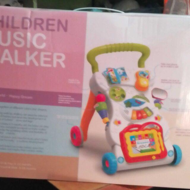 Baby walker and carrier for sale at Iyanaiba ojo market