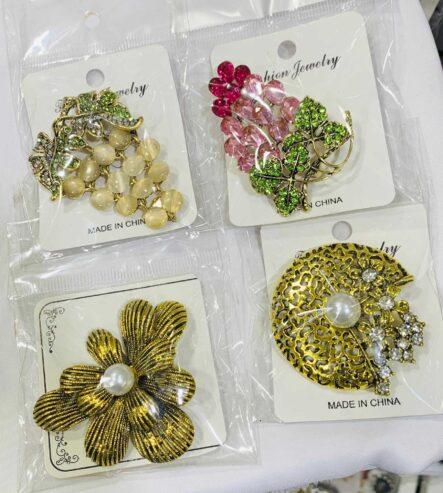 Vintage brooch for sale at balogun market