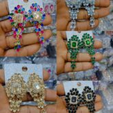 Statement earrings for sale at trade fair