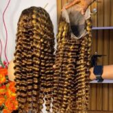 Bone straight human hair for sale at Balogun market