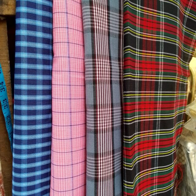 Plain uniform material for sale at suru alaba market