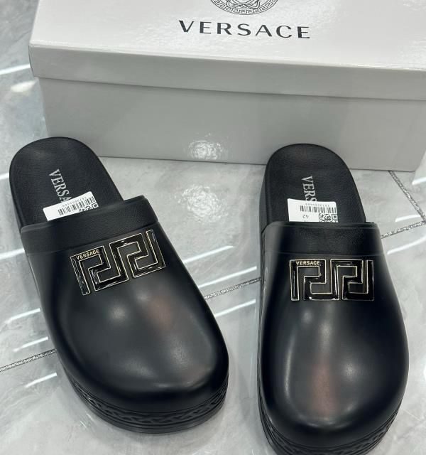 Channel slippers and Versace slippers