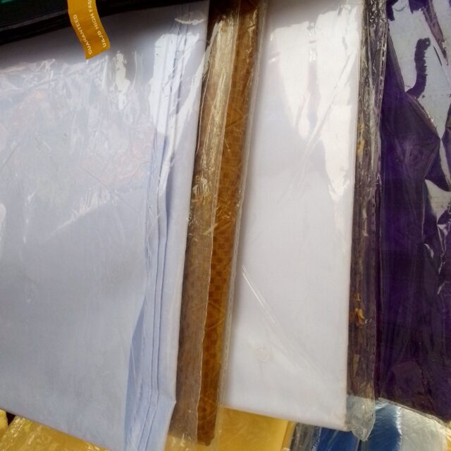 Plain uniform material for sale at suru alaba market