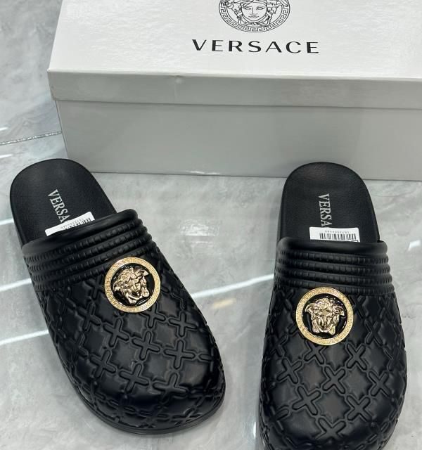 Channel slippers and Versace slippers