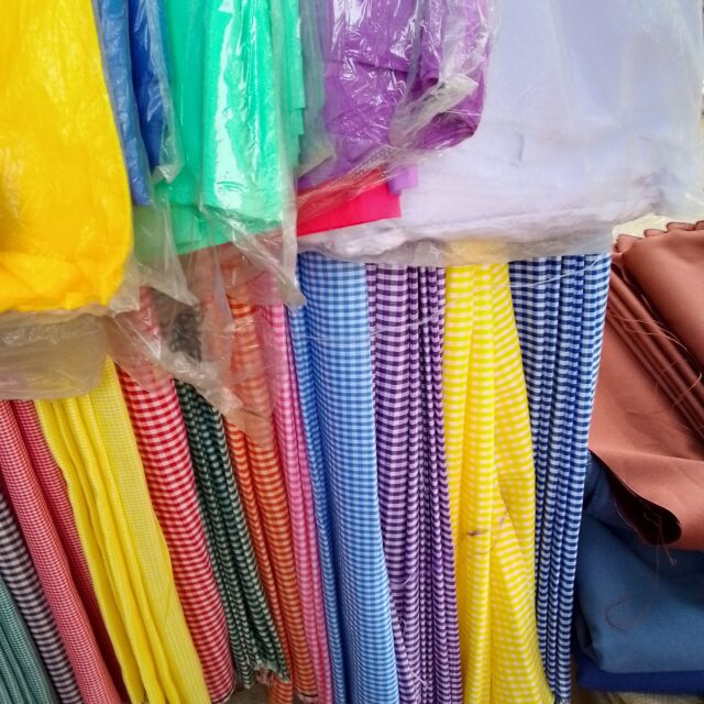 Plain uniform material for sale at suru alaba market