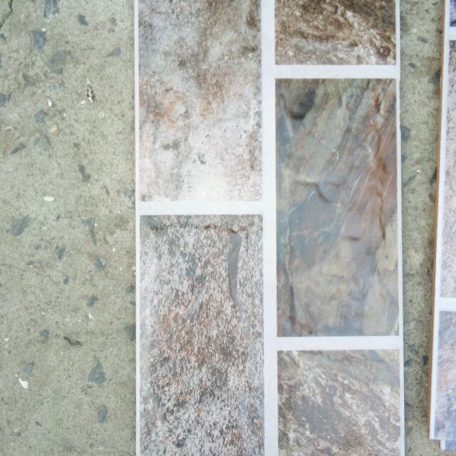 Spanish cracked wall tiles for sale at Odunade Coker orile