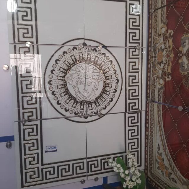 Center decorations tiles for sale at STI market Coker Orile