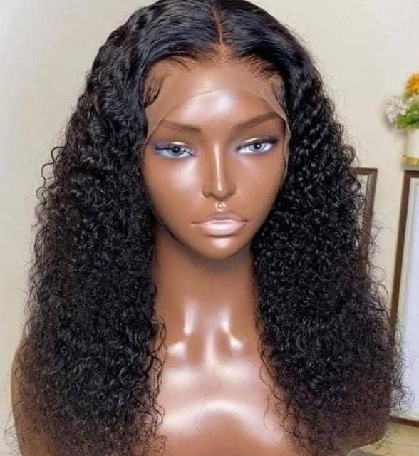 Curly closure for sale at balogun market