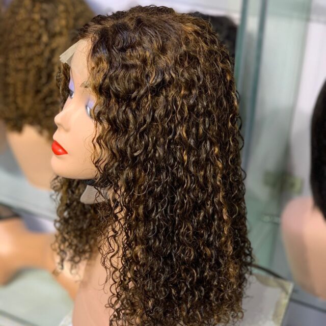 Curly closure for sale at balogun market