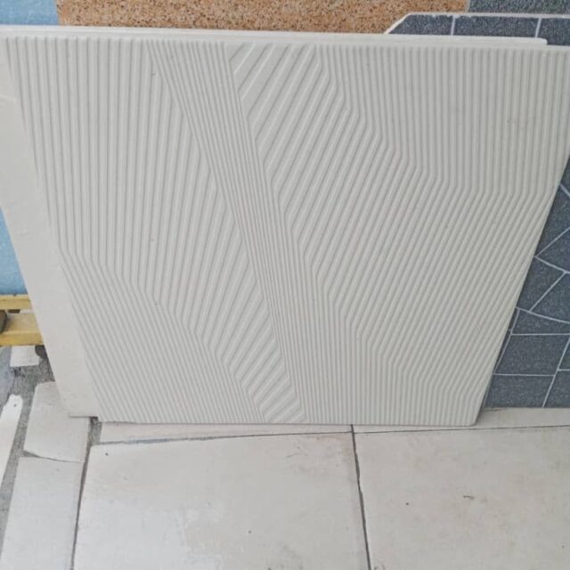 Toilet floor tiles for sale at sti market Coker orile