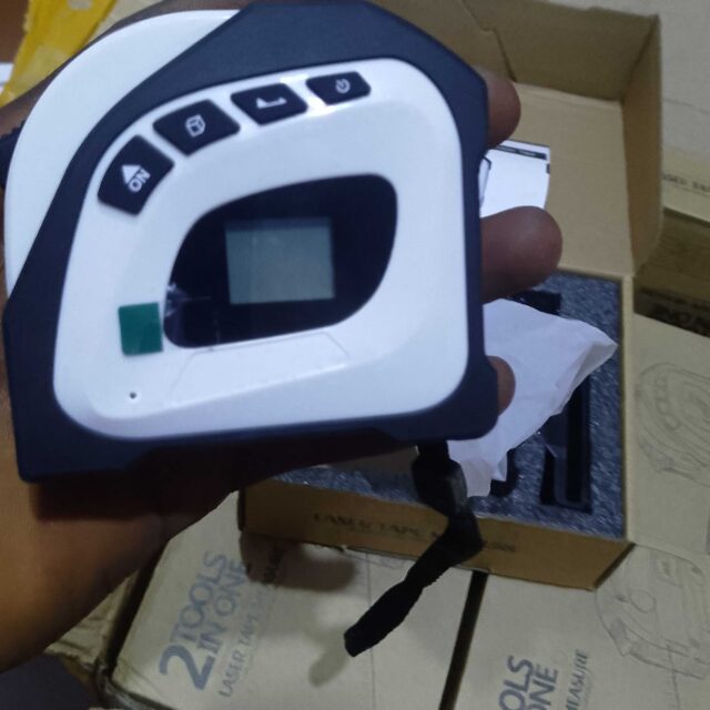 Digital measuring tape with laser