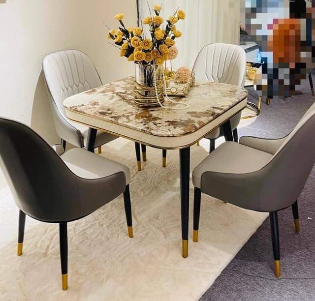 Dinning table by 6and 4 chair for sale in ojo Alaba international