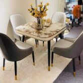 Dinning table by 6and 4 chair for sale in ojo Alaba international