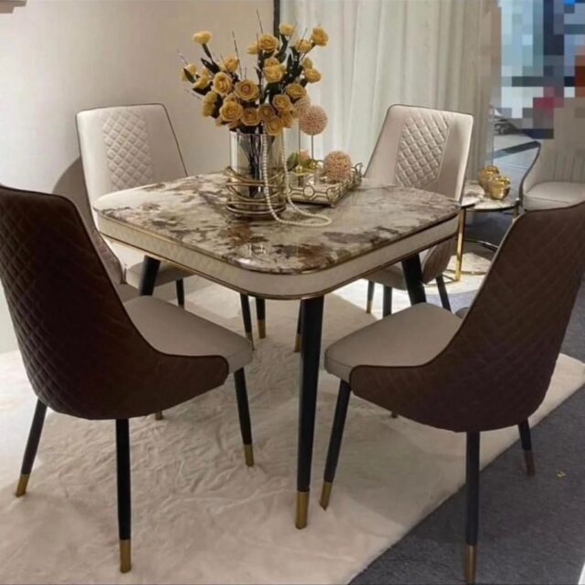 4 sweater marble top dining table and chairs for sale in Alaba internationa