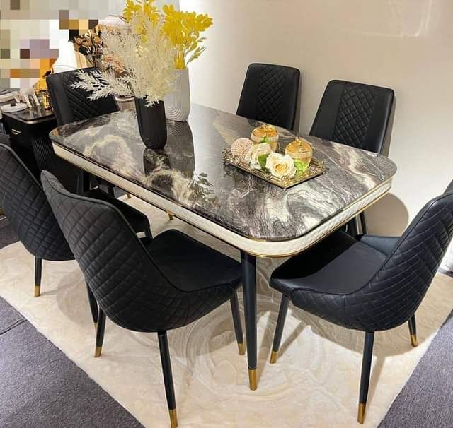 Dinning table by 6and 4 chair for sale in ojo Alaba international