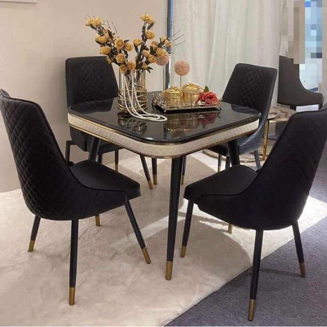 4 sweater marble top dining table and chairs for sale in Alaba internationa