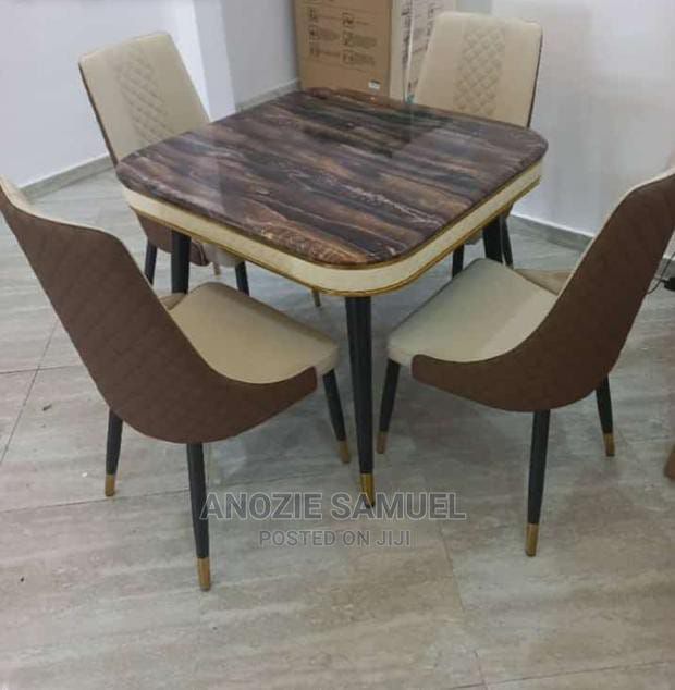 Unique quality marble dining set For sale at ojoalaba