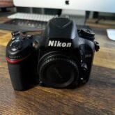 Neat Nikon D610 camera with lens