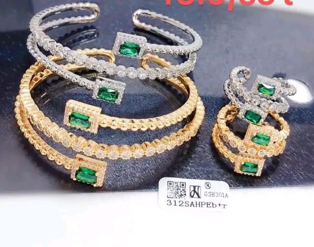 Classic gold and silver bangles for sale at Oshodi